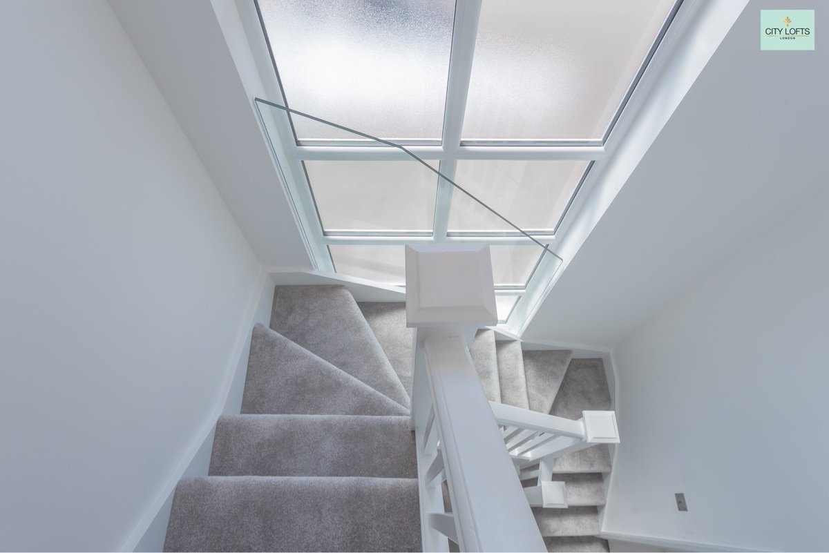 CityLoftsLondon's tweet photo. Double turn #staircase serving the new #loftConversion in #Northwood with an amazing #featureWindow to the #flankwall with a #glassBalustrade to max out #daylight. #lightandairy #hallway #greyCarpets https://t.co/Yr6SWltTaz