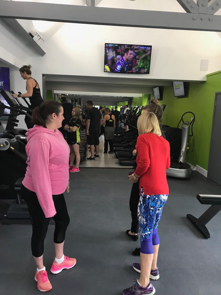 Members having a look around and trying the new equipment out, even our very own GM Gavin showing off his running skills with Steph, in a suit as well!