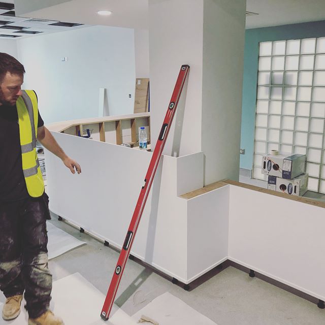 MedspaceUK's tweet photo. One of three bespoke Corian reception counters being carefully constructed on a busy site to help the main contractor be able to hand over on time #Corian #cduk #solidsurface https://t.co/NLbpYoDPQj