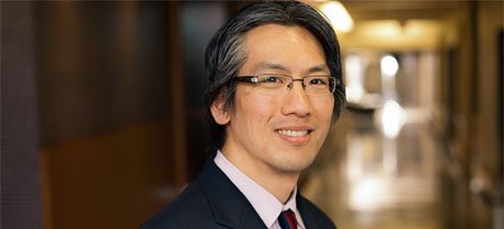A photograph of Dr. Tom Chau.