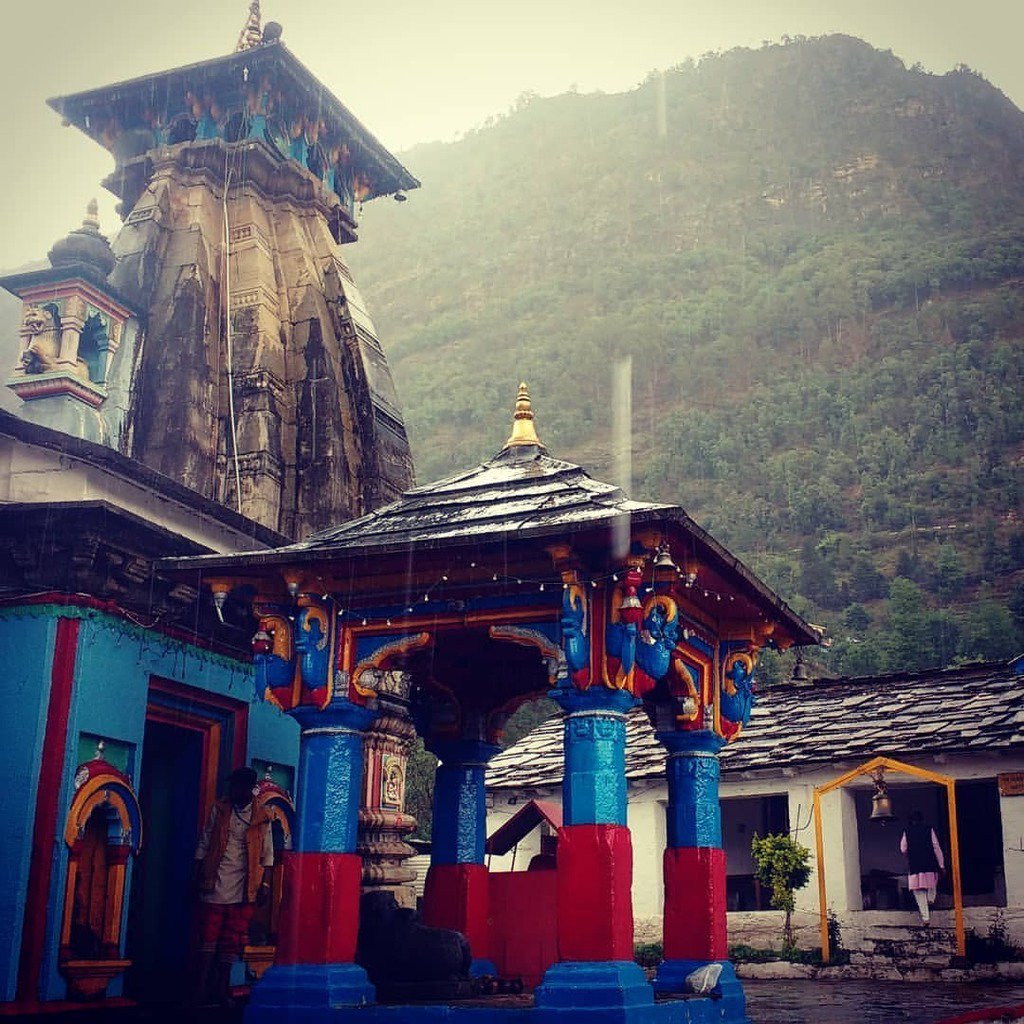 KP_OnTheGo's tweet photo. The Omkareshwar Temple of Ukhimath, Uttarakhand. The temple is known as the winter-seat of Kedarnath. The white building behind the temple houses the Panch-Kedar and Pandav shrines. Captured this image in the middle of a heavy shower of rain that set if numerous mud-waterfal… https://t.co/w88XWhYr3J