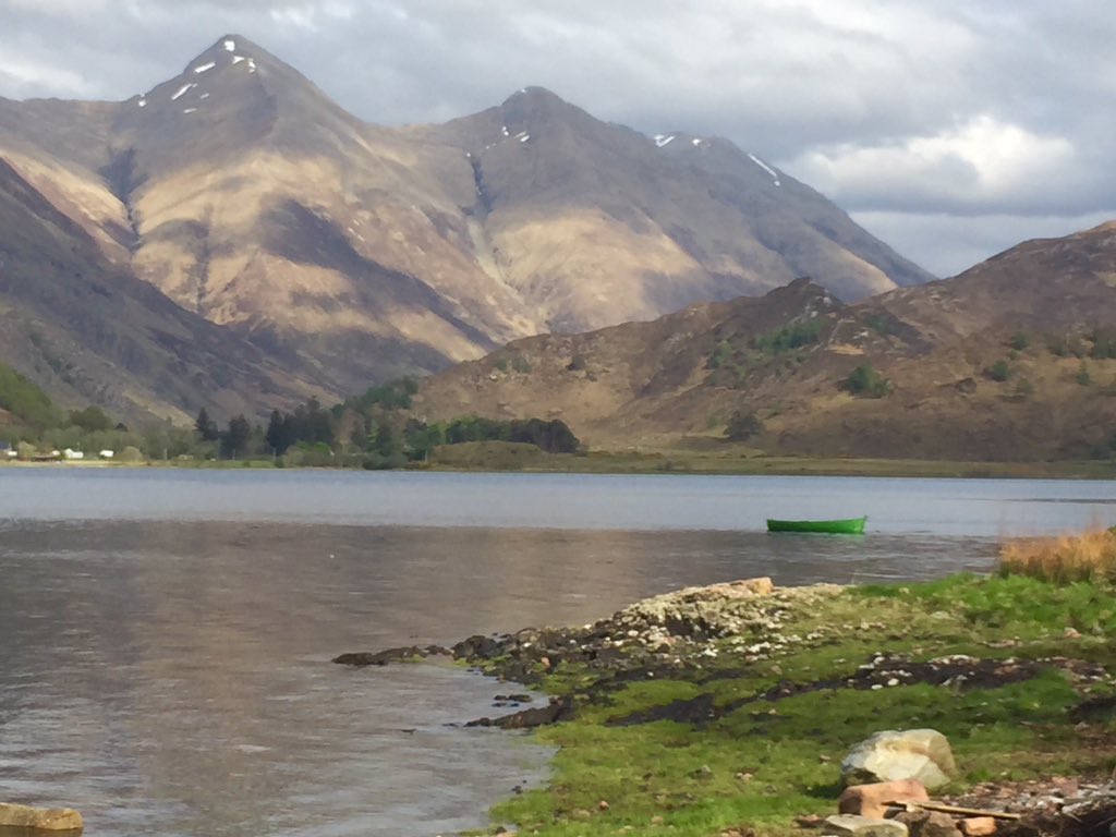 DrP_Manc's tweet photo. Green boat at #Ratagan with #FiveSisters in the background
#Kintail https://t.co/Sfp9EDz8zt