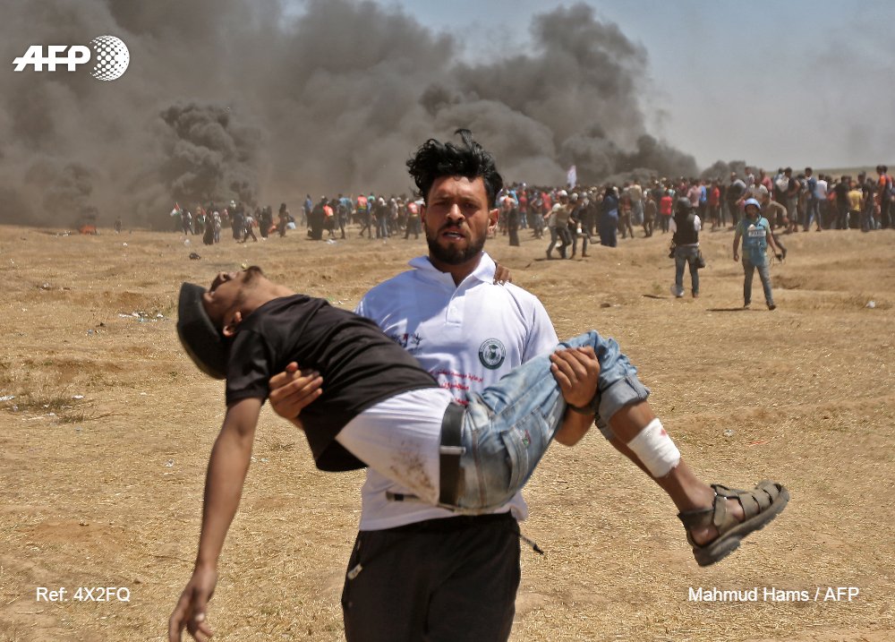 AFPespanol's tweet photo. EEUU abre su embajada en Jerusalén en medio de un baño de sangre en Gaza #AFP https://t.co/ywo1NKpxj4 https://t.co/eicKxvdGJG
