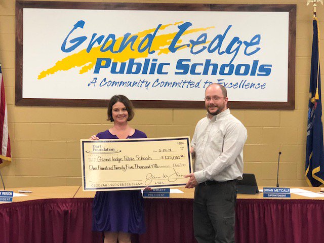 GLPS_rightnow's tweet photo. Tonight, Emily Matthews of the Dart Foundation presented BoE Pres. Shiflett a grant check for $125,000 that the district used to purchase each of our elementary schools 2 new Chromebook Carts. GLPS thanks Dart Foundation for their generosity! #proudtobeacomet #DartFoundation https://t.co/BUmXEy8YAF