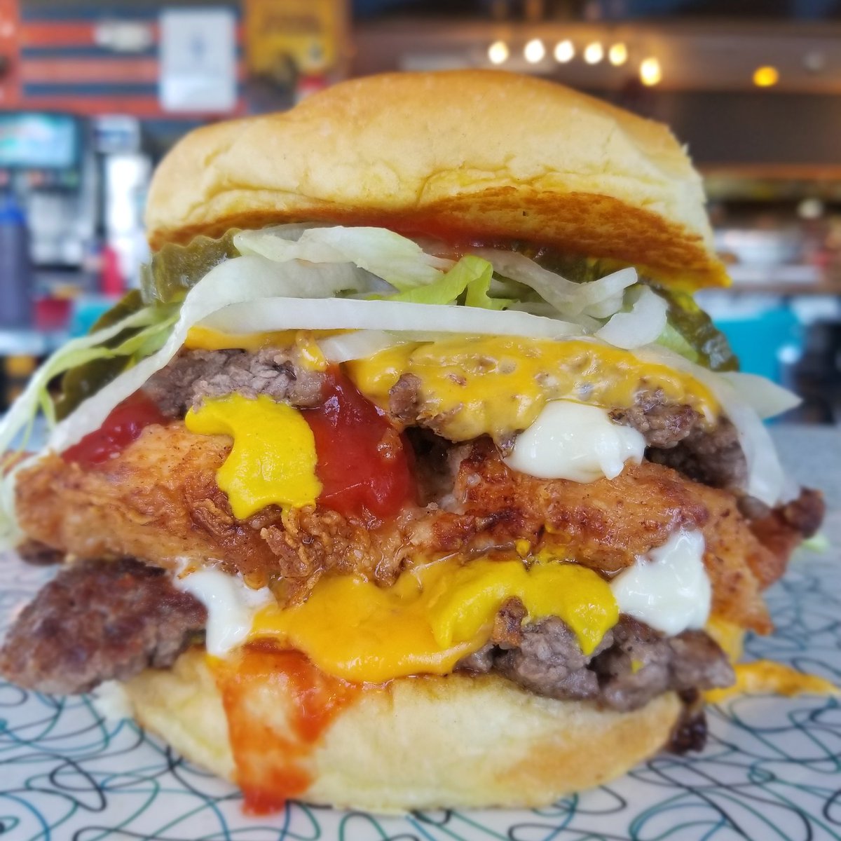 The McBang Bang 
Double burger American cheese lettuce pickle and onion ketchup, mayo,mustard ohhh yea and fried chicken #burgers #fried #chicken #sandwich #eat #delicious #smoke #bbq