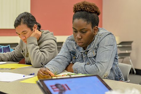 two people writing poetry