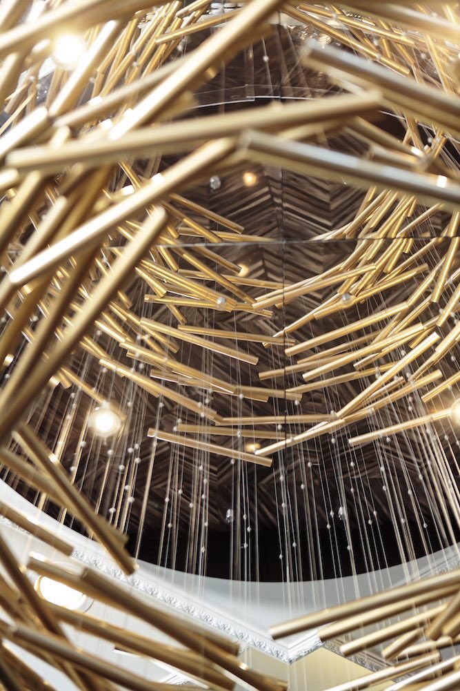 TSL_Podcast_'s tweet photo. Hey Students’ Lounge!!! Check out the #shape is the mesmerizing brass multi-tubed chandelier above the semi circle #macaron bar. The #macaronbypatisse was designed by @NinaMagon!! 
#thestudentslounge #thechaiselounge #interiordesign #interiordesignstudent #macaroons #paris #brass https://t.co/1zCg4bIT6J