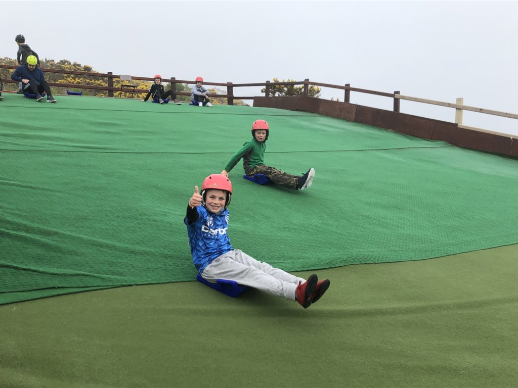 CymraegHawthorn's tweet photo. Grŵp oren yn gwibgartio bore ‘ma. Grŵp oren on the toboggans this morning. @HawthornHighSch #HHSTransition #Llangrannog https://t.co/zA1rB0OVqf