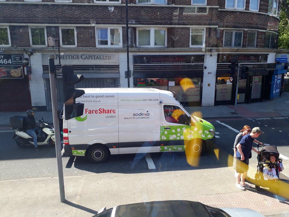 Stuck on bus due to traffic blocking bus lane but what do I spy that makes me smile. Jeff in <a href="/FareShareUK/">FareShare</a> van off to #feedpeoplefirst
