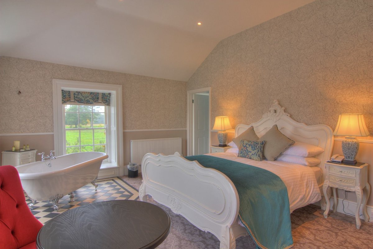 Bellingh4m's tweet photo. Bedroom Profile: Lady Constantine room - This gorgeous suite includes a beautifully comfortable bed, a Victorian style free-standing bath and picturesque views of both the garden and the River Glyde - what more would you want? #castleroom #castleaccommodation #LoveBellingham https://t.co/aEWl7xc6qN