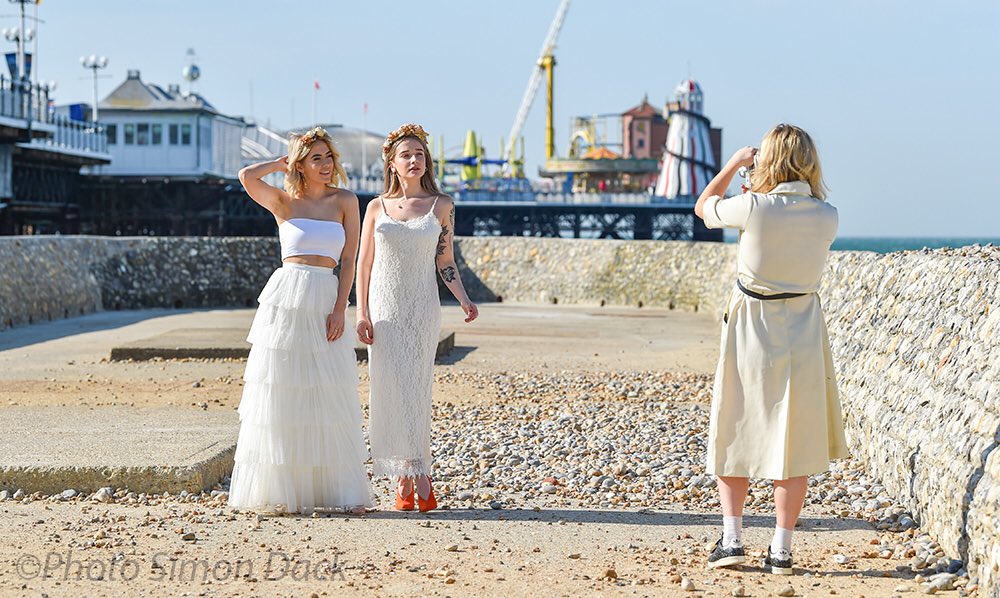 simondackpix's tweet photo. Lovely sunny morning on Brighton seafront for bridal models and detectorists today @AlamyNews #brighton #sunnybrighton #bridalmodels #bridalgowns #fashion @Vervate #weather https://t.co/co1SWEoFsP