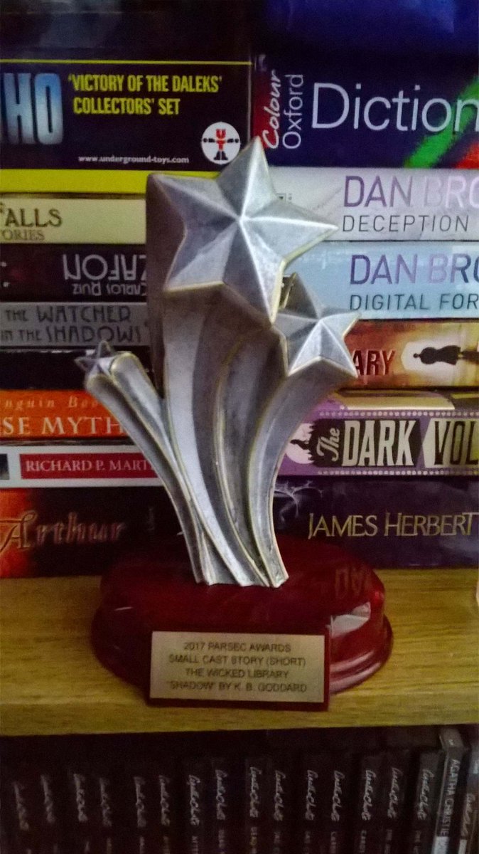 Thanks to our Patreon supporters we were able to order 2 additional Parsec Award trophies and have them shipped to author @KBGoddard (UK) and voice actress <a href="/blamberino/">Amber Collins</a> (AU) (pictured holding her award) for 2017's "Shadows" thewickedlibrary.com/703. Congrats ladies! Well deserved!