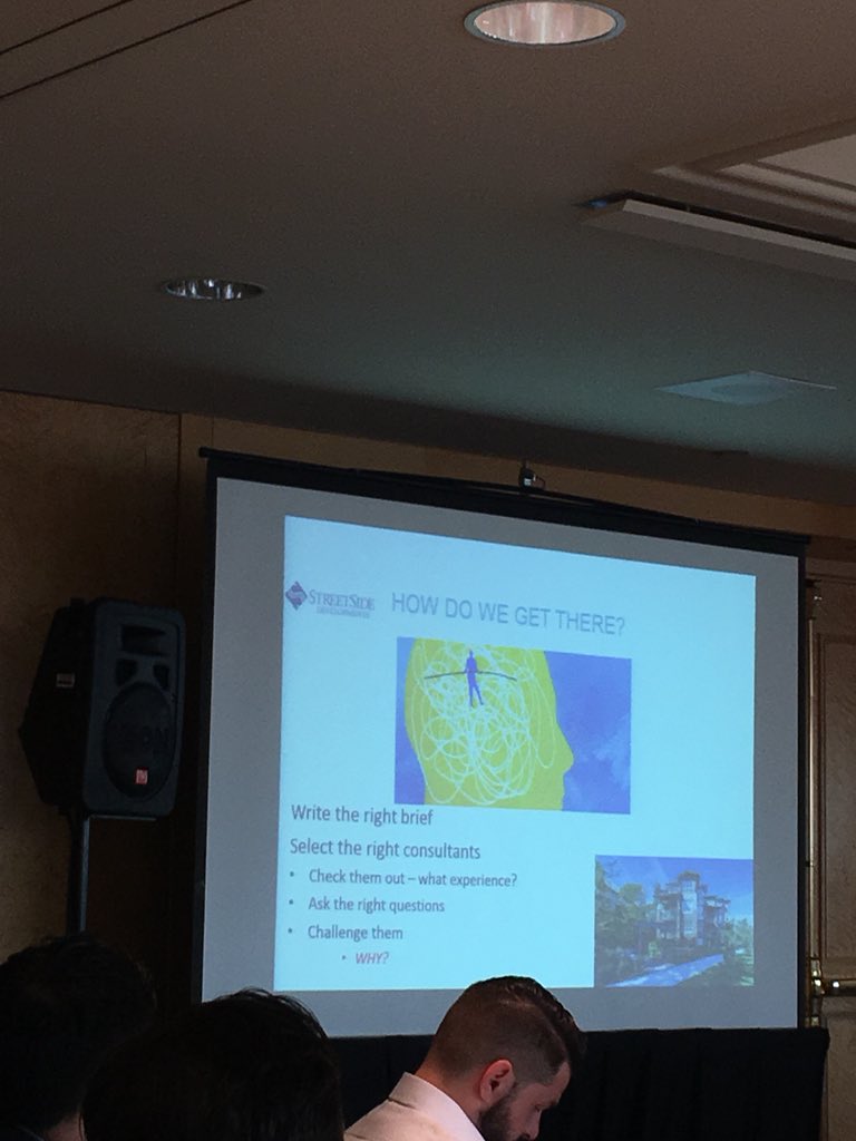 udibc's tweet image. Speaker Jonathan Meads of @StreetSideVan Developments, advises building crowd to challenge consultants and trades to build to higher goals in #energystepcode