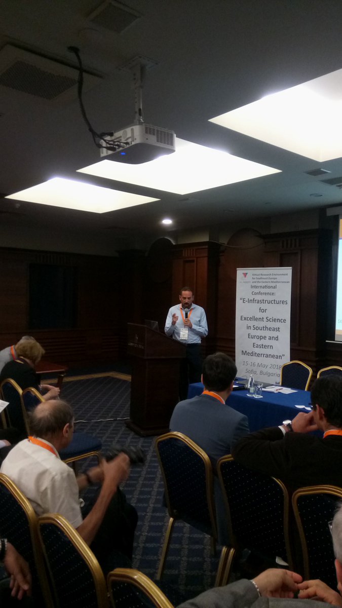 NI4OS_eu's tweet photo. Dr. Ognjen Prnjat, #VISEEM project coordinator presents the history, status &amp; perspectives of regional #eInfrastructure collaboration, emphasizing key developments and regional contribution to the European goals, at the #H2020 VISEEM international conference https://t.co/xuE6V4lekX