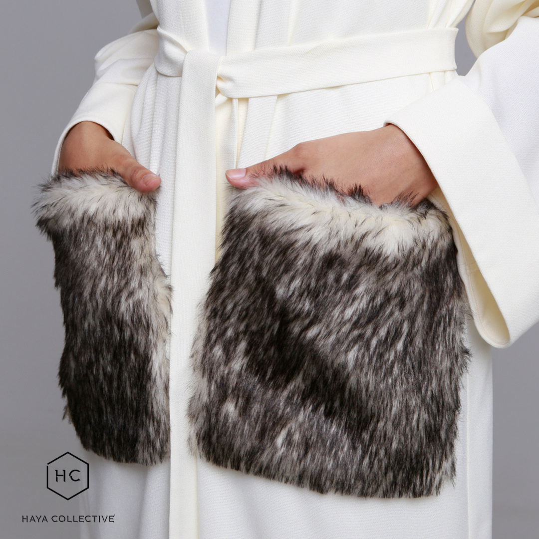 HayaCollective's tweet photo. One of the standout pieces from our #Eid collection, this cream coat abaya is made with fuzzy faux fur pockets and a simple belt for an elegant finish.
Shop the limited edition Anya Abaya (R1299) at https://t.co/rCfNxtq764. 
Eid ‘18 orders close at midnight on Sunday, 20th May. https://t.co/EA5iEEY38h