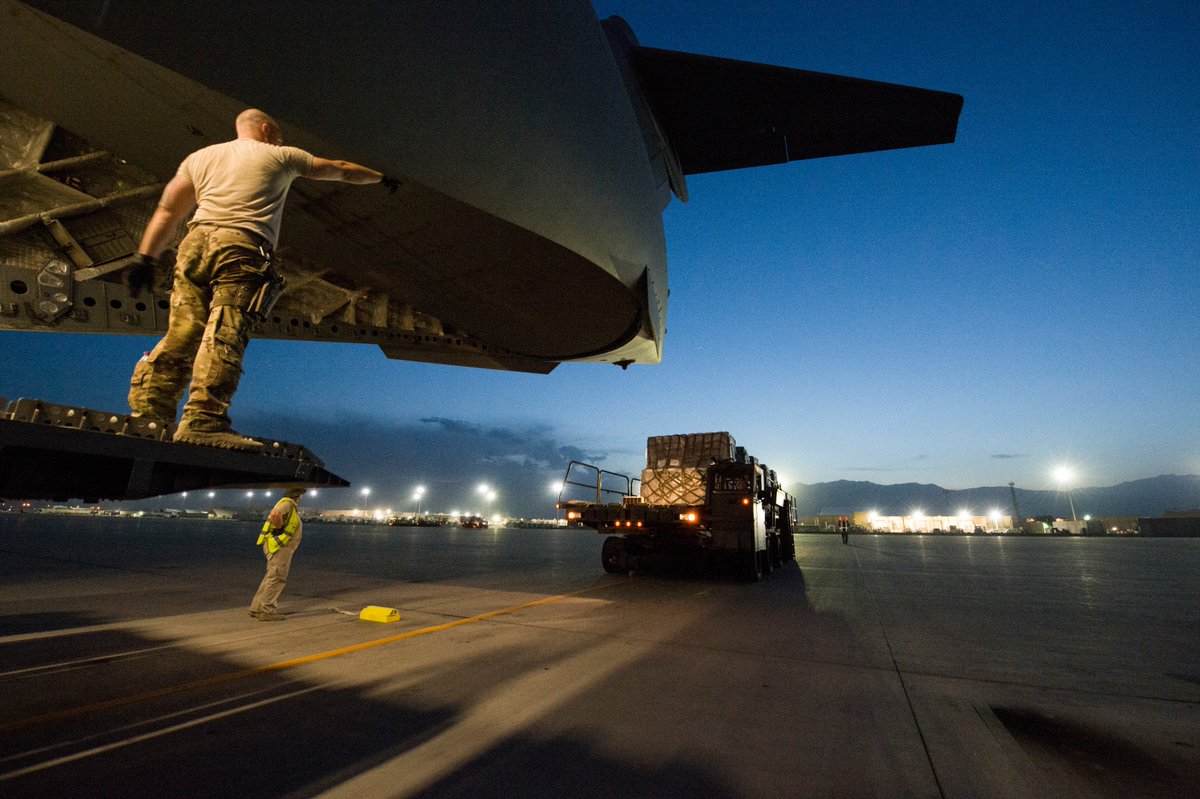 AirMobilityCmd's tweet photo. #TeamMcChord is getting it done! The C-17 crew assigned to the 816th Expeditionary Airlift Squadron loaded container delivery system bundles at Bagram Airfield in support of Operation Freedom Sentinel, May 10, 2018. #TTailTuesday

@JBLM_PAO 
@CENTCOMPashtu https://t.co/4S6XCVJ9Gs