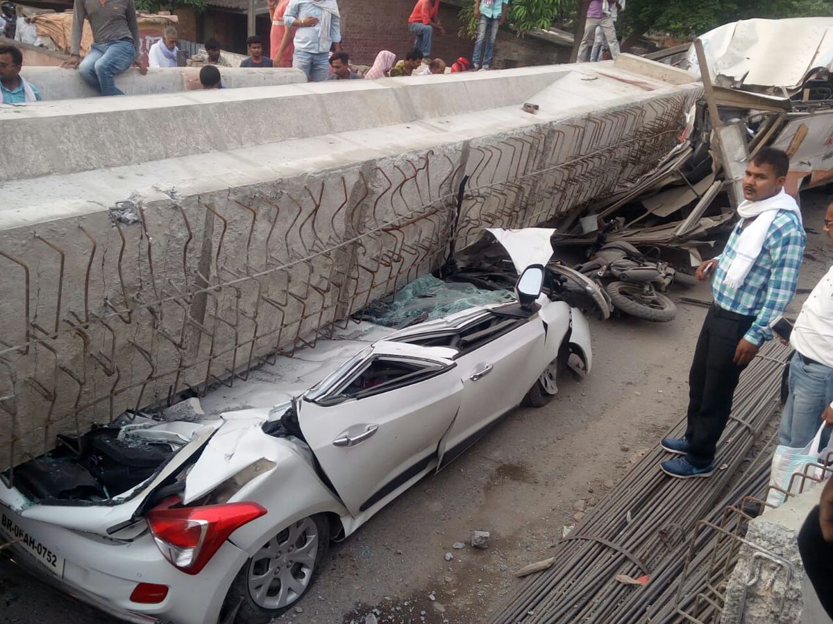 Vehicles came under the slab of flyover fallen near Cantt railway station in Varanasi.