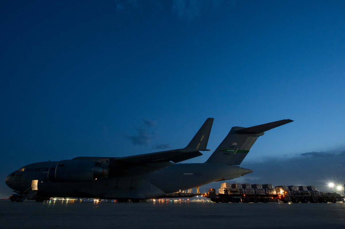 AirMobilityCmd's tweet photo. #TeamMcChord is getting it done! The C-17 crew assigned to the 816th Expeditionary Airlift Squadron loaded container delivery system bundles at Bagram Airfield in support of Operation Freedom Sentinel, May 10, 2018. #TTailTuesday

@JBLM_PAO 
@CENTCOMPashtu https://t.co/4S6XCVJ9Gs
