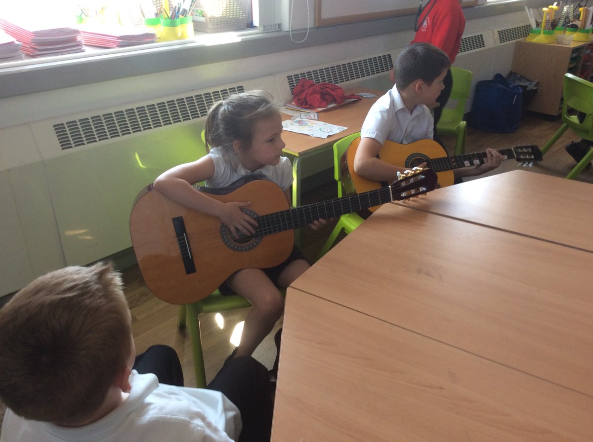 MerseyYear2's tweet photo. Enjoying another fab guitar lesson with Mr Wilcock. #MPAmusic @MerseyPrimary https://t.co/bRxdHuinQ8