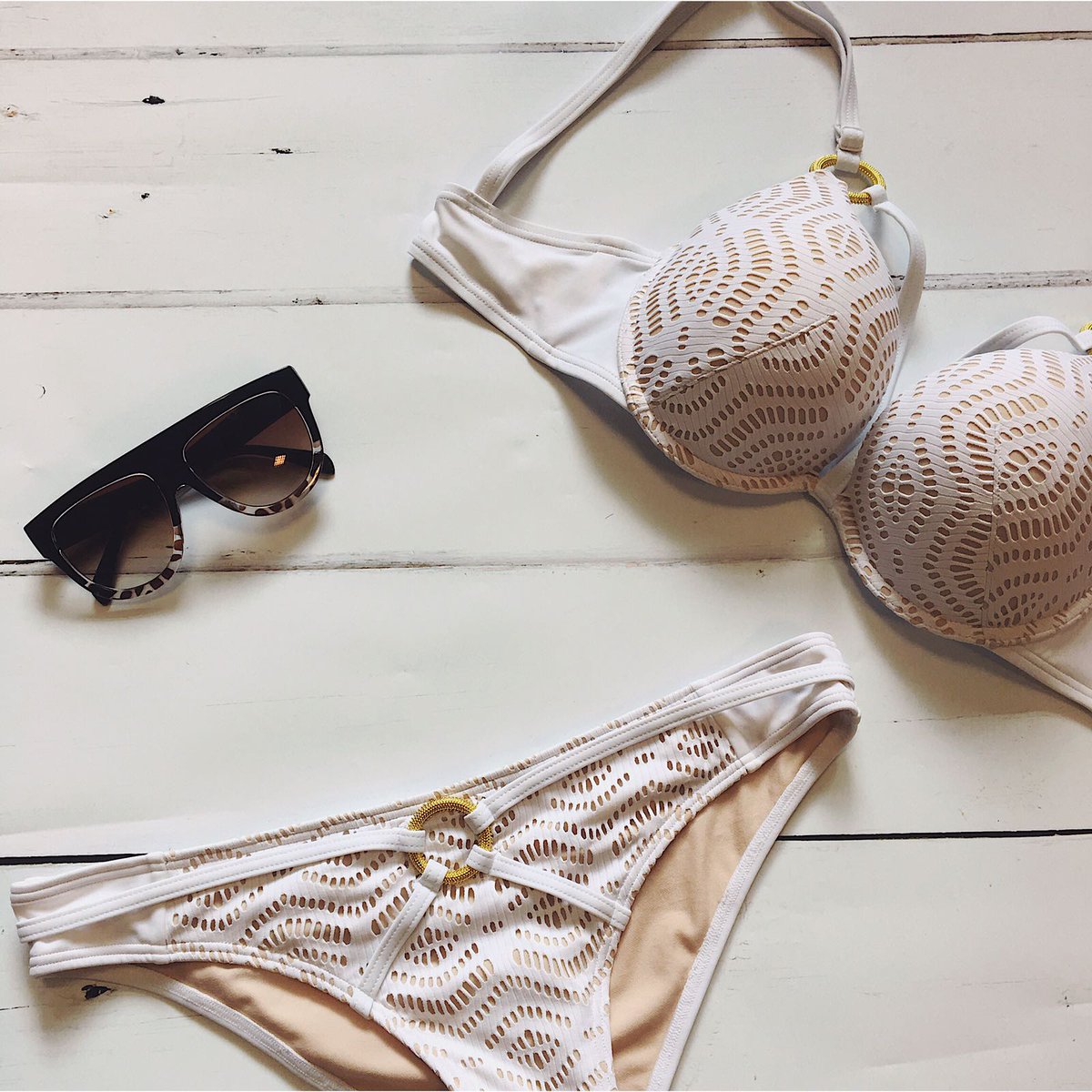 AnnSummers's tweet photo. Show off that holiday glow in the white and nude Aroa bikini #DiscoverAS #ASYourStyle https://t.co/pH7963lk4U https://t.co/B6h1j1XkCB