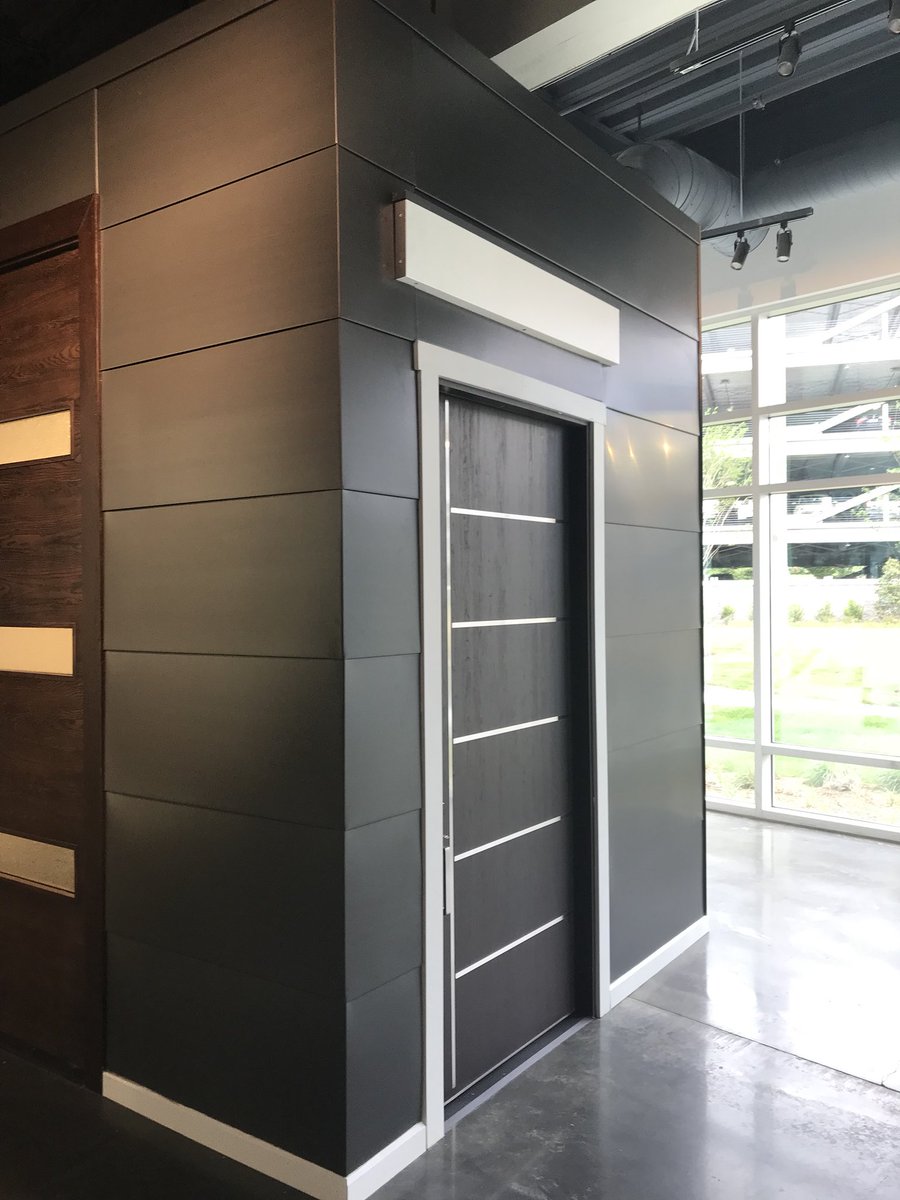 BGoulds's tweet photo. @dmimetals @RHEINZINK_DE custom flat lock wall panels @JELDWEN showroom installed by #bonillabrothersroofing https://t.co/2BWYVofleV