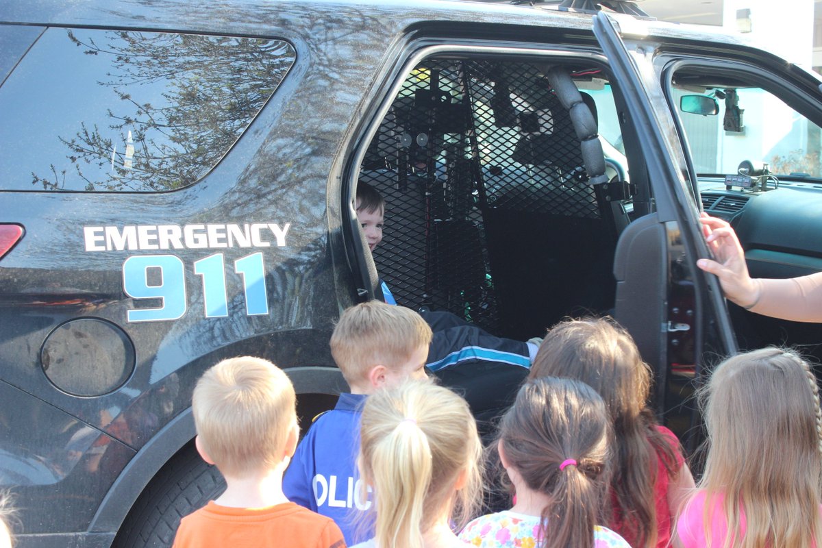 LakeAreaTech's tweet photo. In commemoration of Go Blue Week, our @LakeAreaTech Educare kids visited with Officer Johnson who talked about her role as a police officer. The kids really liked checking out her car! Thanks Officer Johnson! #GoBlueWeek https://t.co/4TCABHpgWl