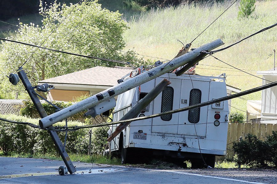 Pickup takes out pole and power lines on Mar Monte Avenue, La Selva Beach, Monday.