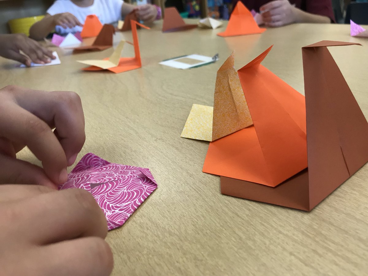 luvmathweston's tweet photo. Creating origami flowers to join our duck family ... kindergarten origami masters hard at work with Michael LaFosse. @westonpublic https://t.co/8MJN828Ff8