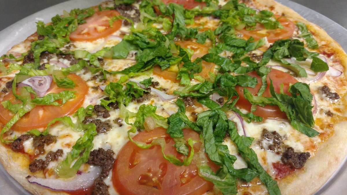 125MSGrill's tweet photo. Cheap pizza, buckets of beer and $4 Pineapple Mules; what more could anyone want on a Tuesday? https://t.co/slEkclUwFQ