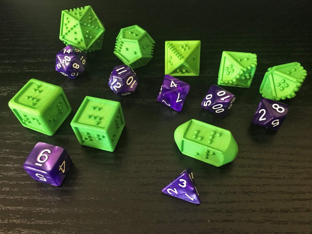 DOTSrpg's tweet photo. Lets get some #dice love today! Here's our set of #braille dice next to a generic set. #AccessibilityMatters in all things, especially the #ttrpg community! Tag your favorite gamers, streamers, podcasters, and industry people and show them the beauty that is our #brailledice! https://t.co/sj1QANAyZS