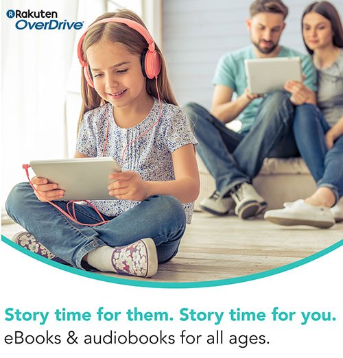 a child on her headphones smiling listening to an audiobook, parents in the background looking at e-reader.