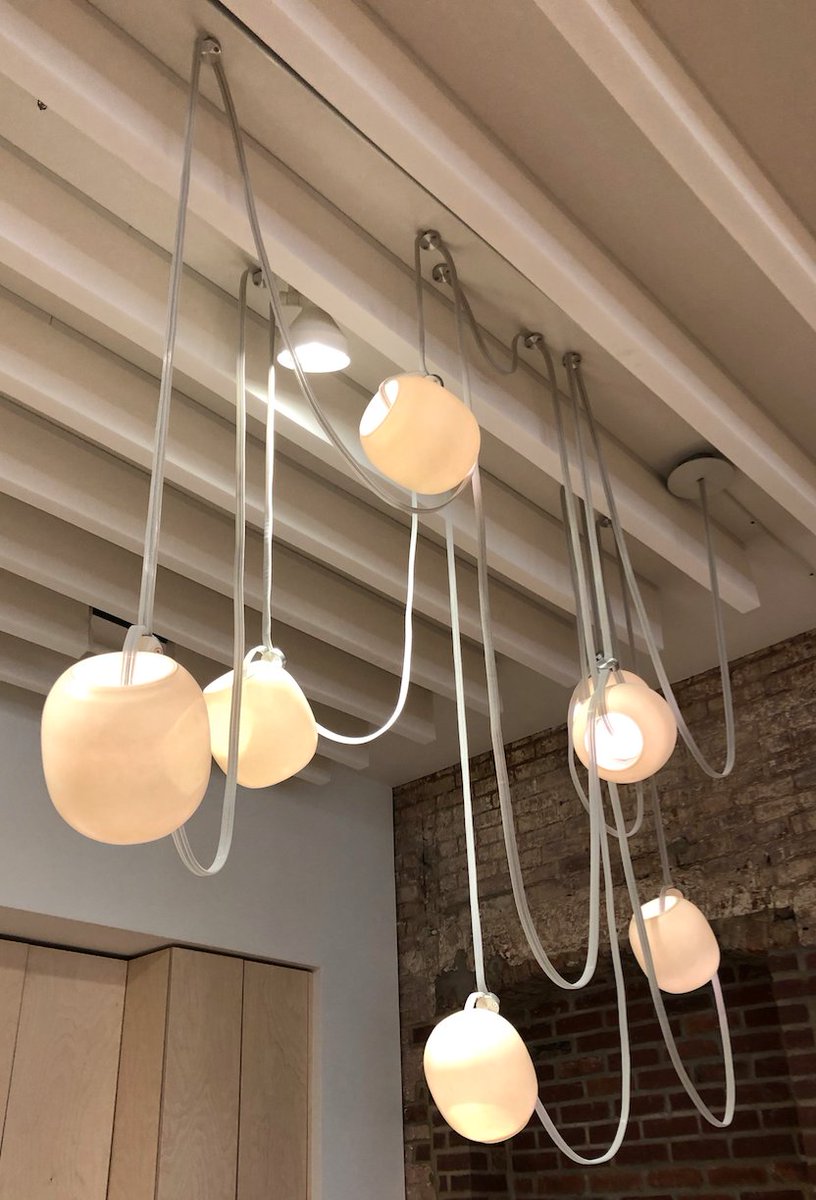InteriorDesign's tweet photo. Conceptual OLED fixtures encased in 3-D knit fabric and clustered grape-like glass Vitis lights at Rich Brilliant Willing. #NYCxDESIGN https://t.co/GrwlDZzTsF