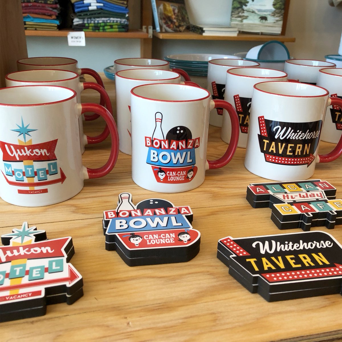 CollectiveGoods's tweet photo. Our new Retro Yukon series has landed! Mid century mash up of real and imagined Yukon establishments. Our latest design collaboration with Yukon illustrator, Tedd Tucker. 4 designs: mugs, magnets, coasters + more https://t.co/zB9MJevz6J
