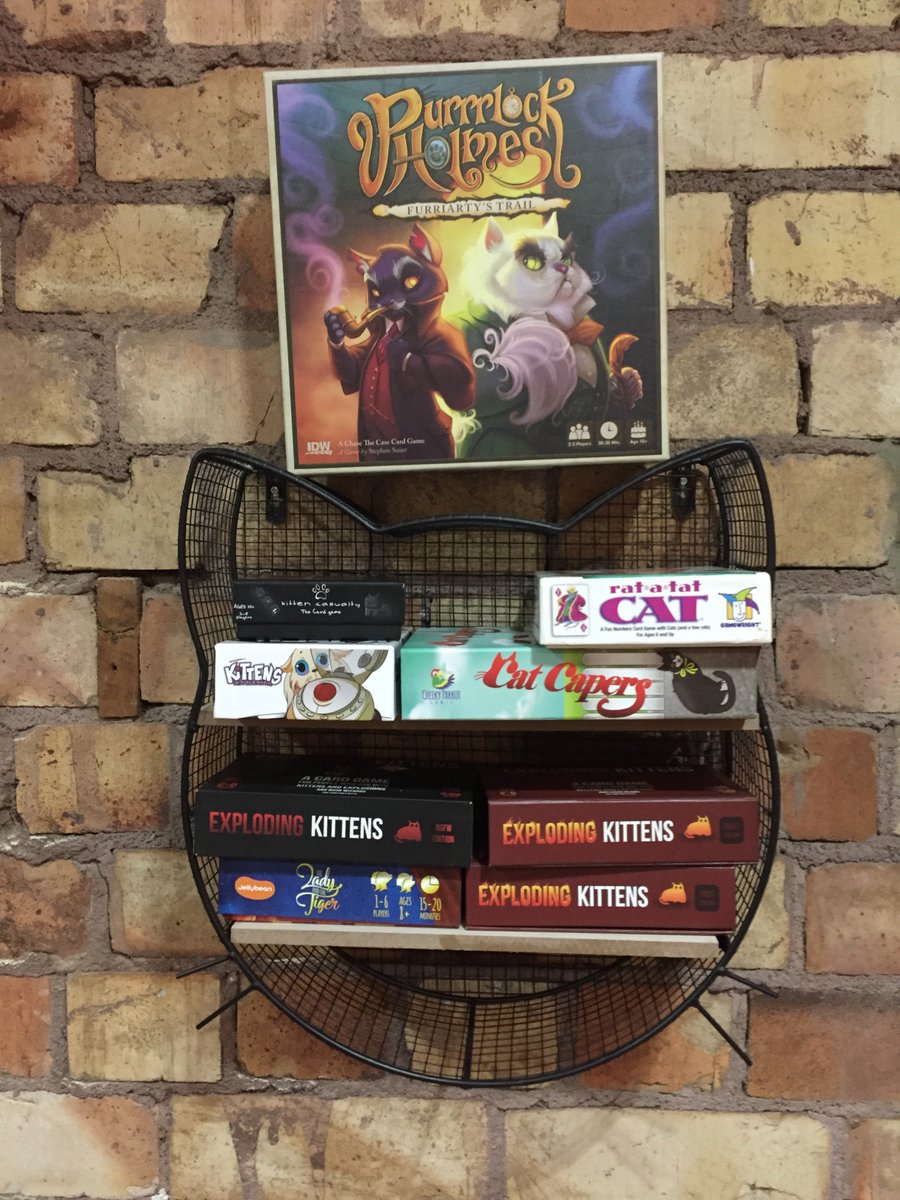 CheekyParrot's tweet photo. Loving this display of cat-themed games, including our #CatCapers at @CakesnLadders in Auckland. https://t.co/S9ADJTRRKl