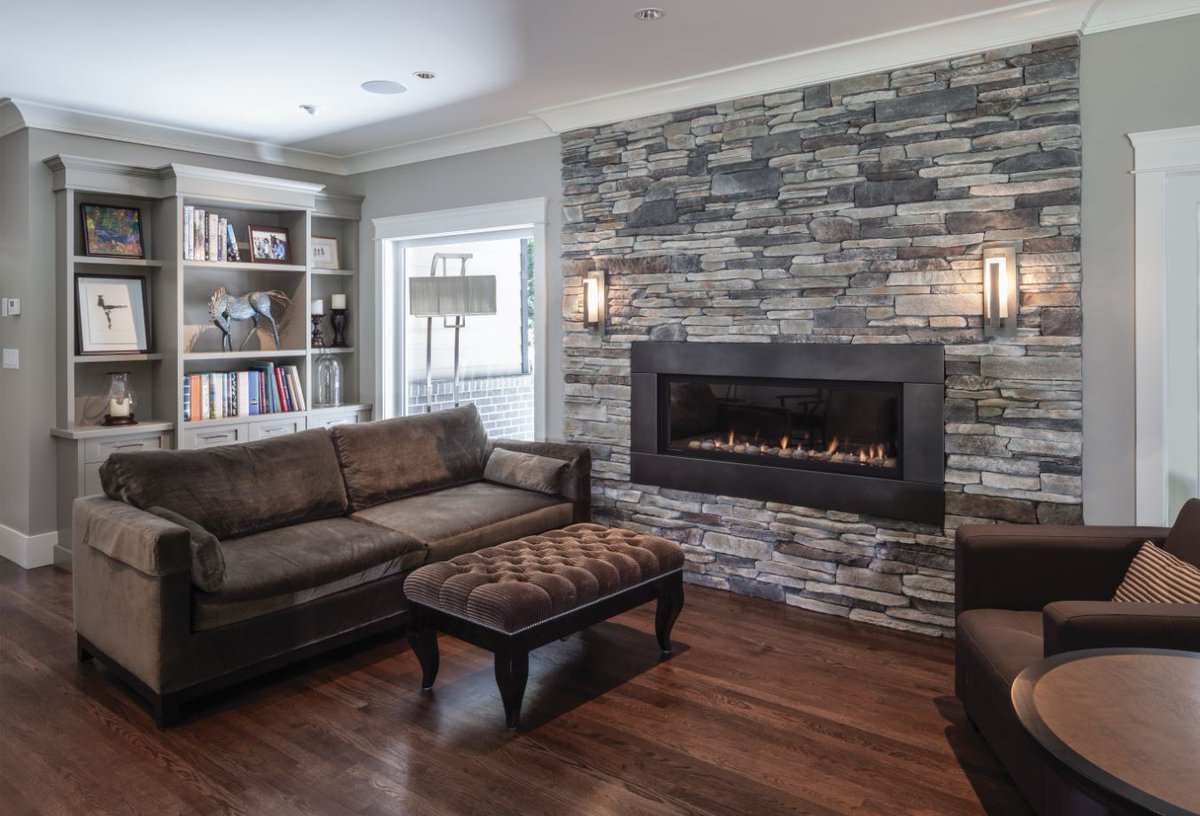 Southern Ledgestone's rugged and informal appeal offsets the clean lines and modern elements of the glowing fire feature to #MakeAStatement on this #accentwall. 

Pictured: Southern Ledgestone in Echo Ridge bit.ly/CSSouthernLedg…

Photo Credit: <a href="/dereklepper/">Derek Lepper</a>
