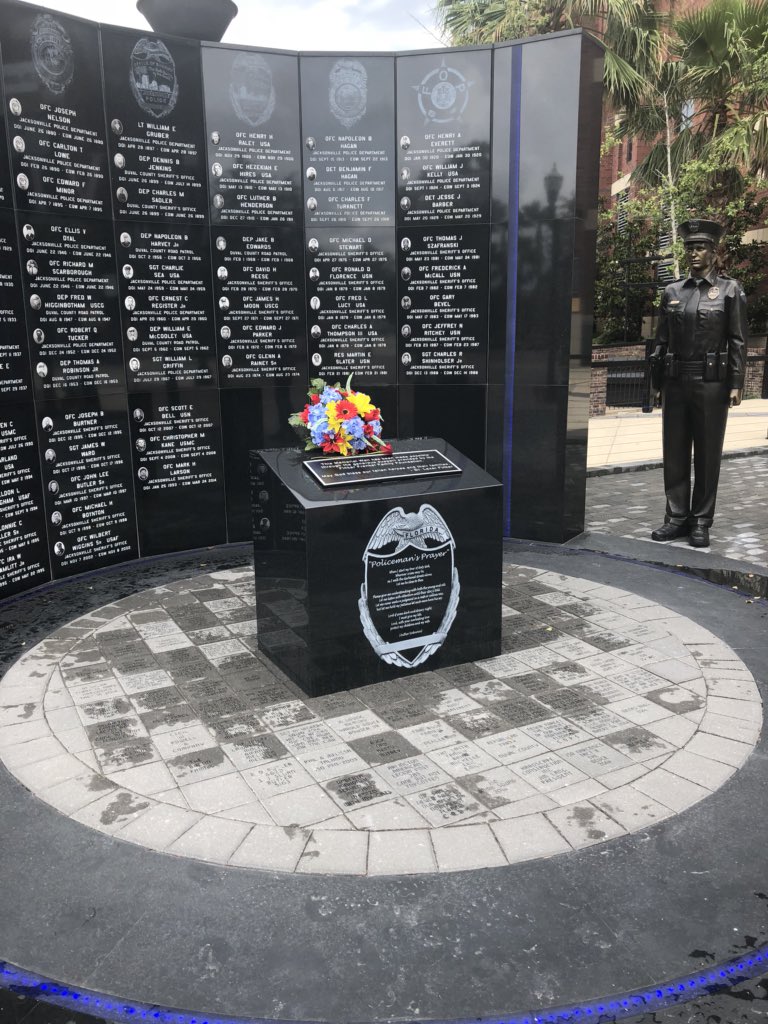 JSOPIO's tweet photo. A memorial area for anyone wishing to leave flowers or sentiments for Officer Lance Whitaker has been set up at the Fallen Officers Memorial (in front of the Jacksonville Veterans Memorial Arena) located at 300 A. Philip Randolph Boulevard, Jacksonville, Florida 32202. https://t.co/R5xO5PfiU1