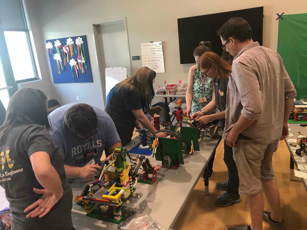 PlayWell_TEK's tweet photo. Our Kansas/Missouri Play-Well Staff playing, training, and building a Great Ball Contraption Machine our of LEGO at their annual summer kick-off. #play #fun #playmatters #learningthroughplay #playwell #playeveryday #playalways #lego #legofan #legocity #fun #STEM #engineer https://t.co/61VBl0x2WB