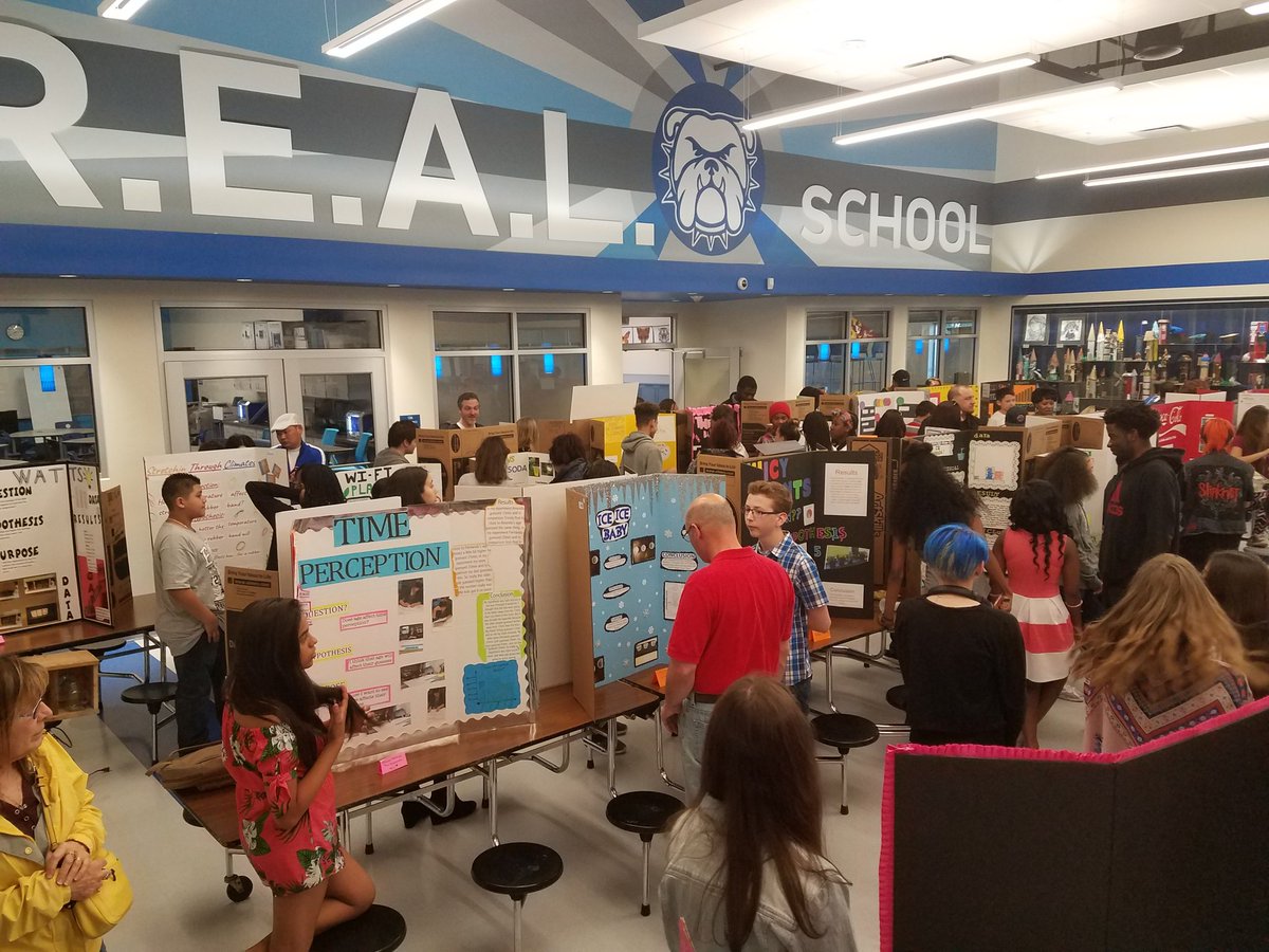 REAL School 7th graders displaying awesome science projects! Thanks Laura Egan for another great fair! #BEREAL