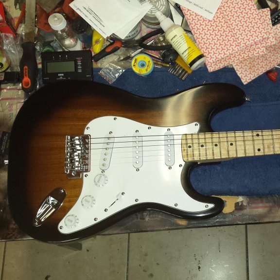 BlackbeardsDen's tweet photo. Rika's been a loyal customer for some time - this custom Strat has to be one of her best finishes! A dark Tobacco burst is also not easy to achieve. #STR20 #lespaul #blackbeardsden #customguitar #custom #diy #electricguitar #music #instrument #guitars #diyguitars #diyguitar https://t.co/pms4KlIJn4