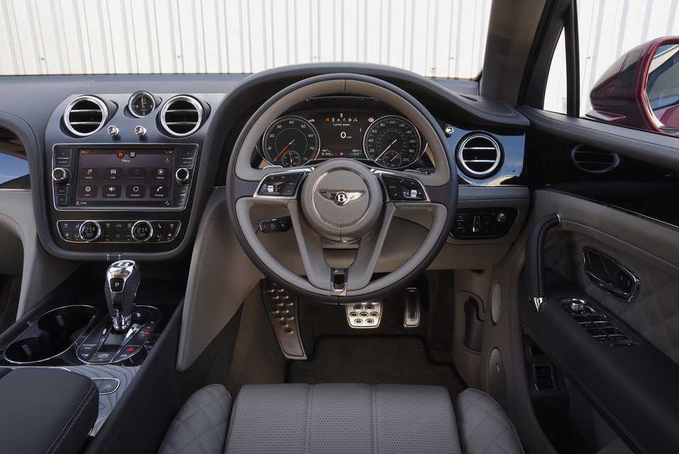 whatcar's tweet photo. For a car that sells in such relatively low volumes, it’s remarkable that the Bentley Bentayga now offers a choice of three engines – we drive the new 4.0 V8 petrol version https://t.co/wFhg6RbPsS https://t.co/8zGxPshCIe