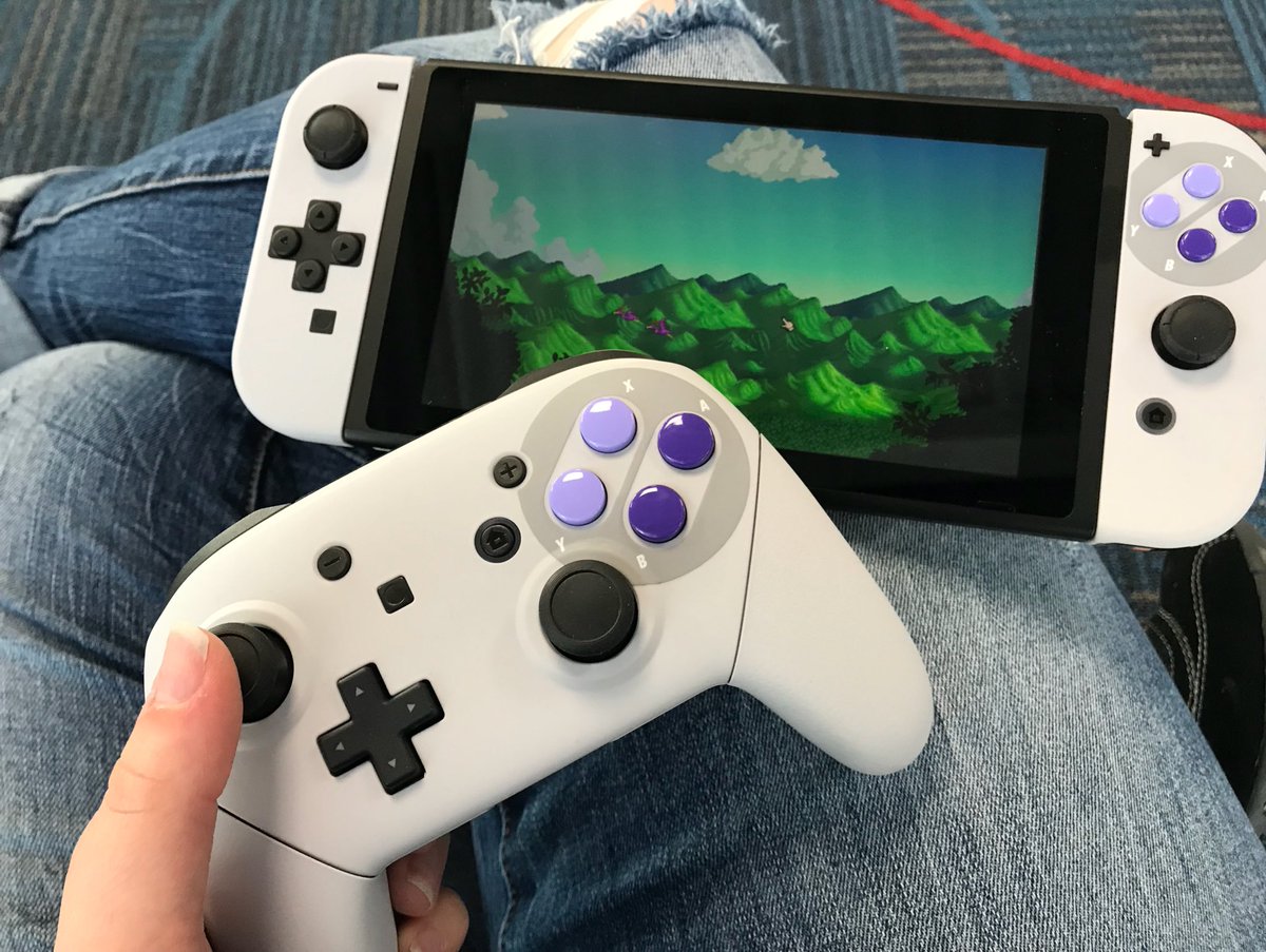 aureylian's tweet image. Today’s 2 hour flight delay, made bearable with my Switch (and the new joycons and Pro controller @ColorWare sent me, just in time for this trip 💜)