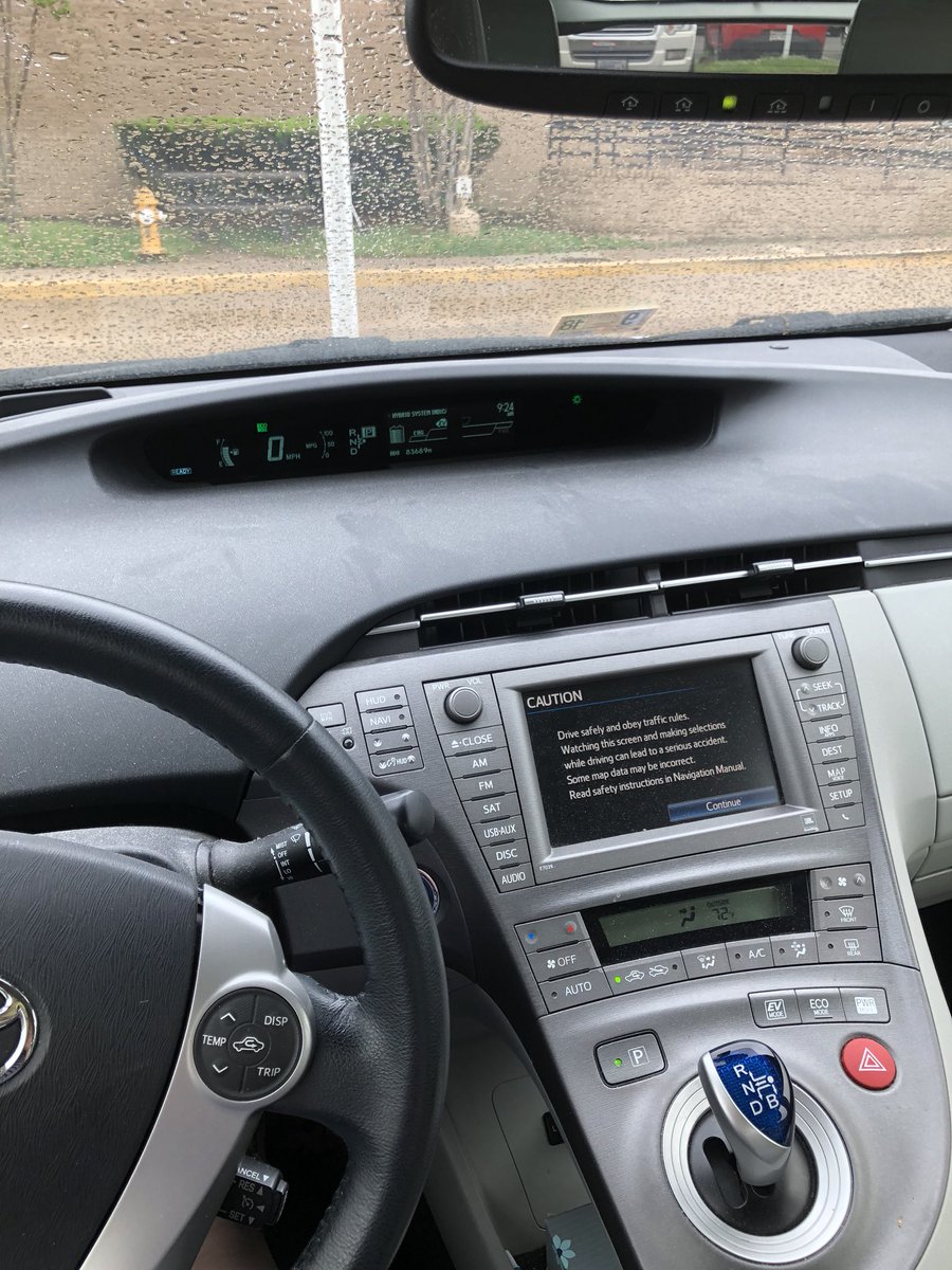 LFShackelford's tweet photo. When you’re taking transit, but still need to get to inaccessible places, you drive the spaceship (Prius) the President leaves at the office all week for people to use. COMMITMENT to the @BigGreenCommute! #wabgc2018 #howdoidrivethisthing #greenteam Thanks @MikeW_Wells @WellsAssoc https://t.co/knob4lzSTZ