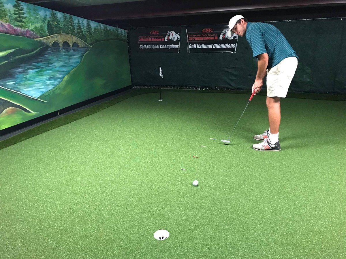 GMCJCGolf's tweet photo. It may be raining outside, but we never miss a day of practice. Thankful for great facilities like the Mason Golf Performance Lab and our @FullSwingGolf simulator to help us prepare for the upcoming national championship. #GoBulldogs https://t.co/609ig5P4BP