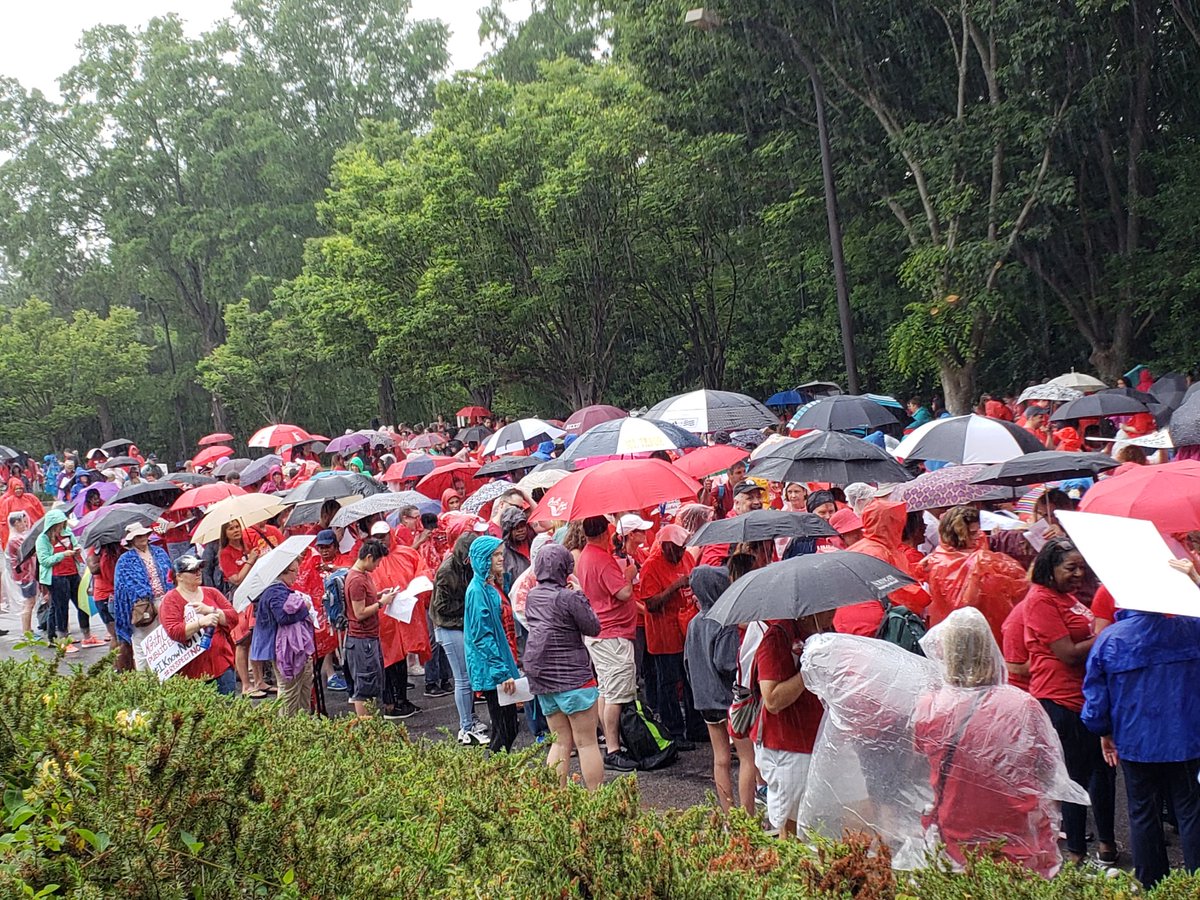LeonardCWS's tweet photo. The rain ain't driving us away! #Red4Ed https://t.co/oC0c3uwdp0
