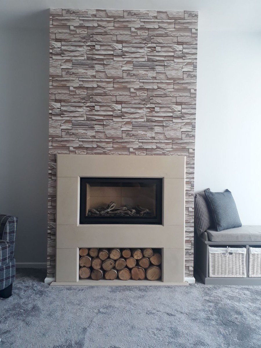 BeautystoneFire's tweet photo. Custom stonework by @BFireplac encompassing a gorgeous 'Studio 2' from @StovaxGazco including the driftwood fuel bed. Log store/Storage area created beneath adding height and grandure to a great design! Love the wallpaper Choice by the way! https://t.co/3undRpvISU