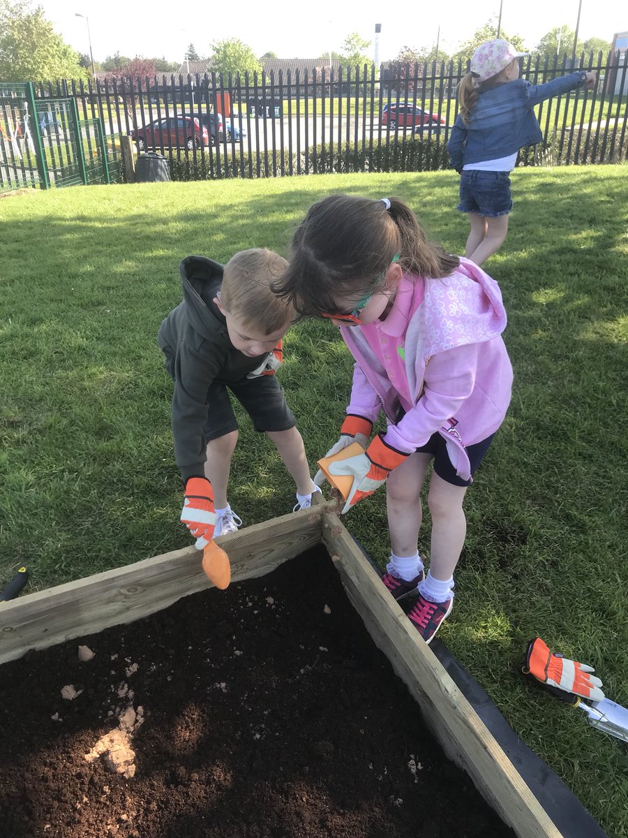 StNinsNursery's tweet photo. #AMgroup starting our #veggarden today! John the Janny says if we put some sand in with the soil it will make our veggies grow bigger! https://t.co/PD5mwpxTFU