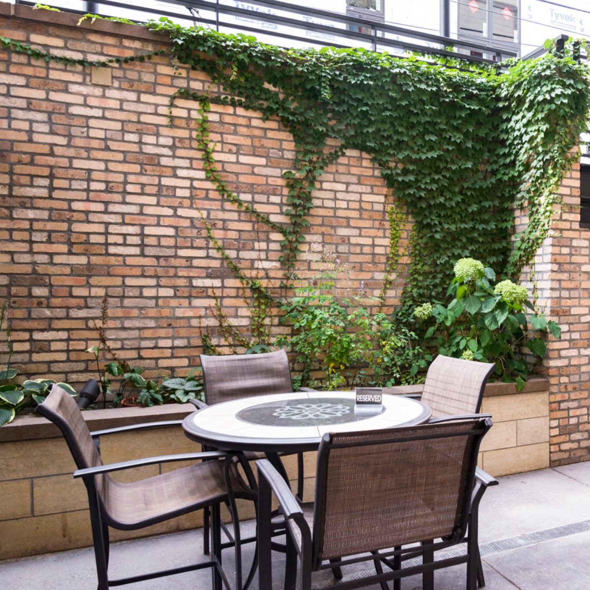 Relax on our patio with a cocktail -- you deserve it.