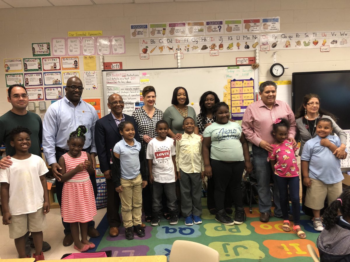 2nd Graders at Cascade Elementary School in Atlanta and UPSers that are their tutormate tutors! Once a week reading with these children for 30 min while the UPSers are in their their offices via computers. What a great program! I am pictured with JaNayah...
