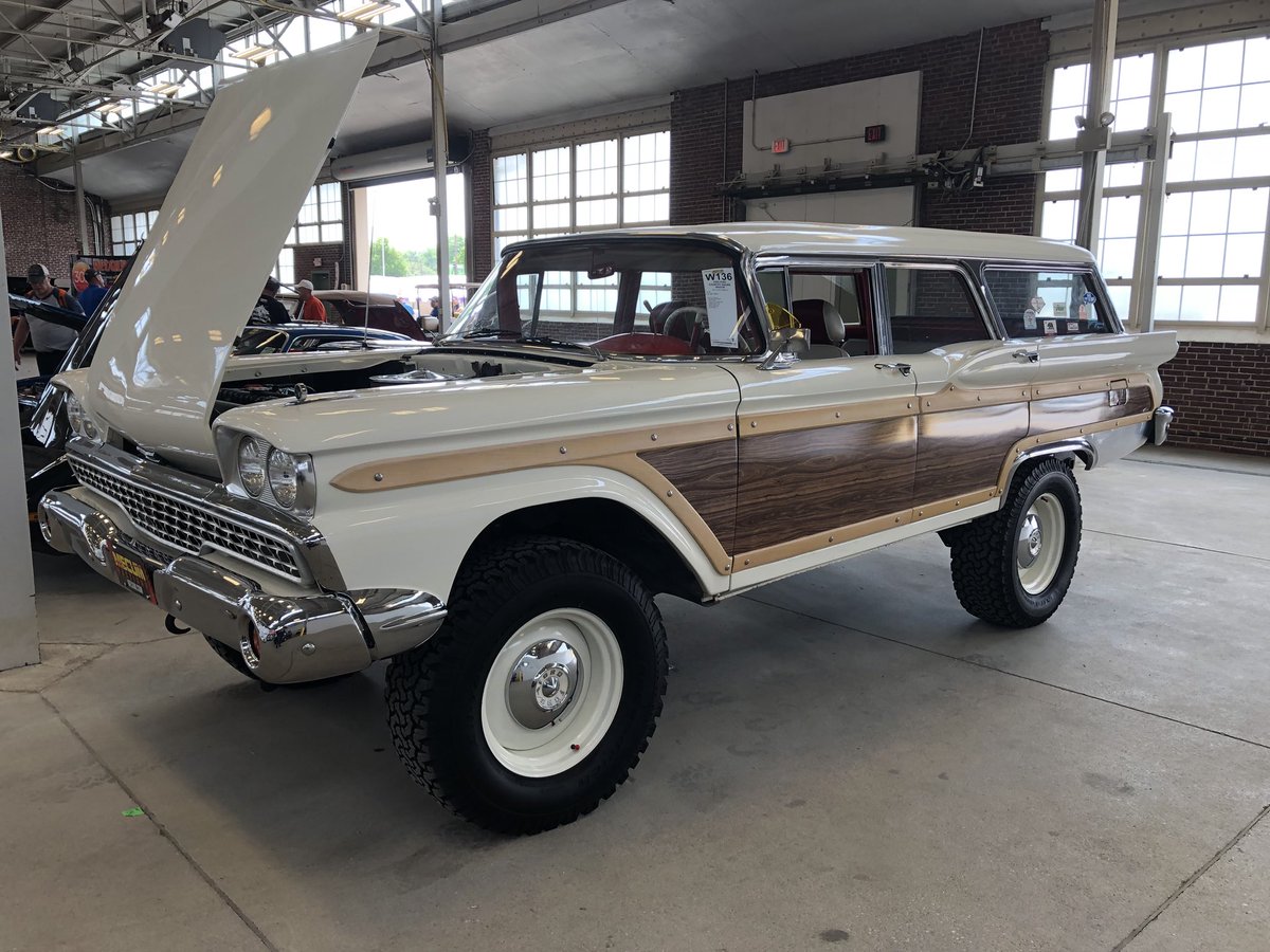 hagertyinsider's tweet photo. What do you think of this family truckster? A 1959 Ford Country Squire on a 4x4 chassis. Wild! #MecumIndy lot W136 selling this afternoon. #colincomer #hagertyinsider https://t.co/ptVdVVZmON