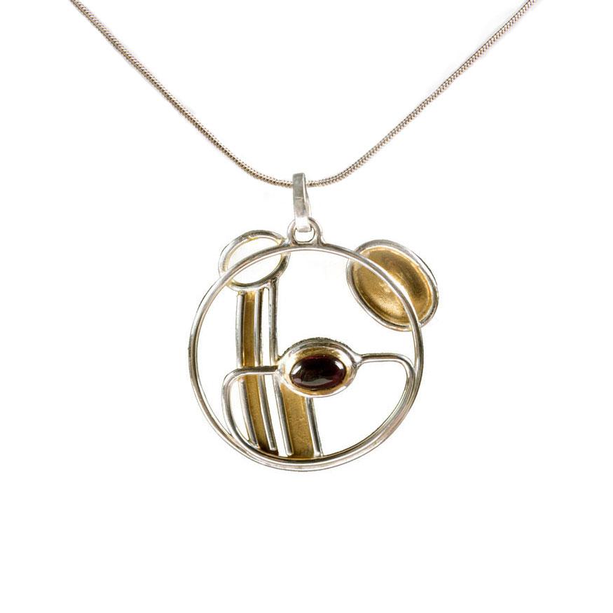 New to our range of beautiful Mackintosh inspired jewellery, is this necklace with an organic leaf and bud motif. The gold and silver pendant features a red garnet stone and references Art Nouveau. Matching earrings also available: 
gsashop.co.uk/collections/je…